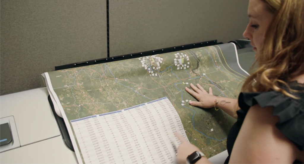 GIS analyst looking at a map.